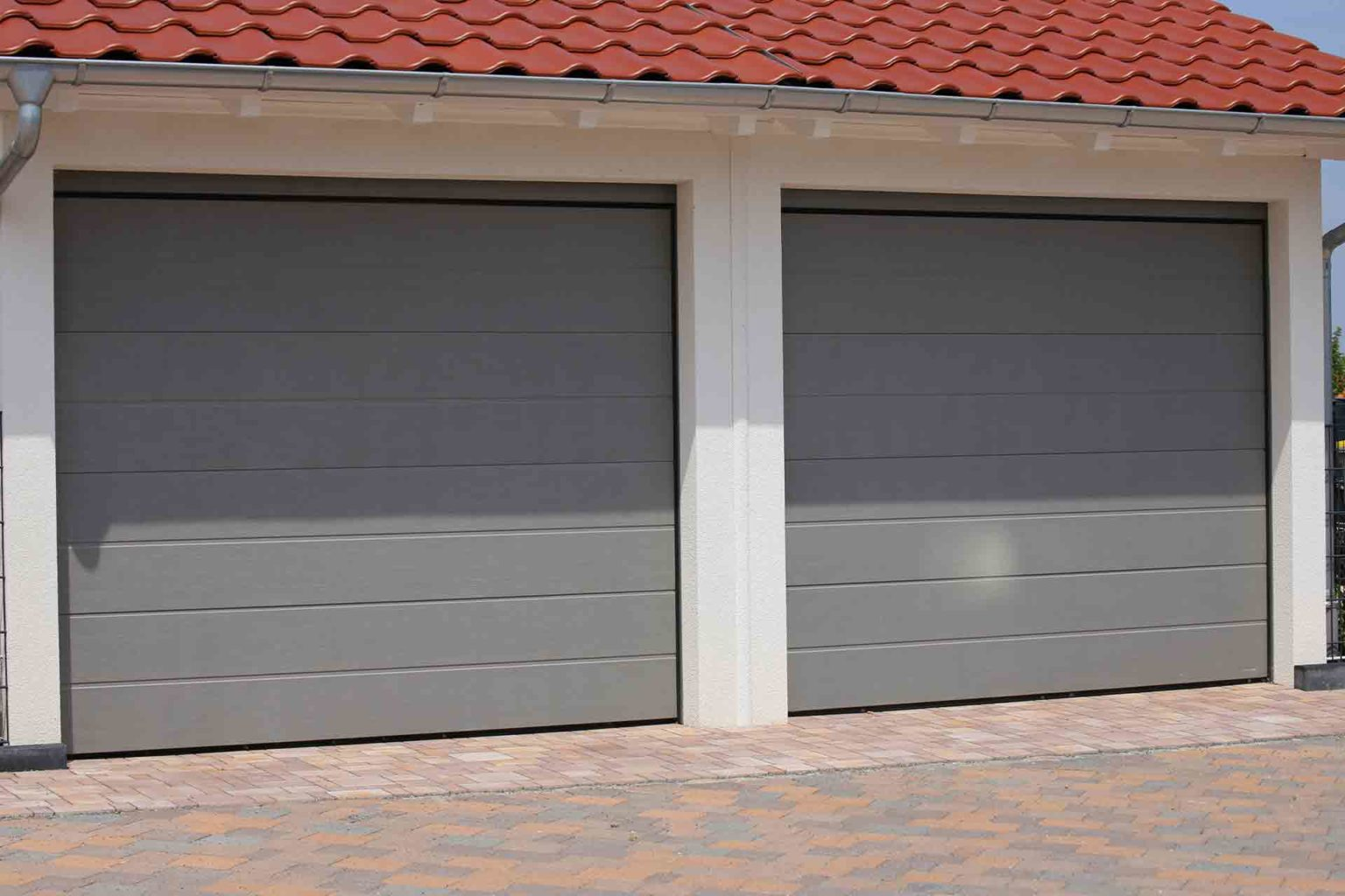 How much room do you need for a sectional garage door