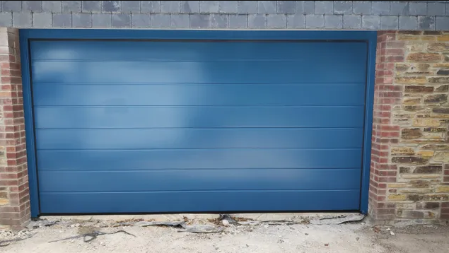 What are the disadvantages of sectional garage doors