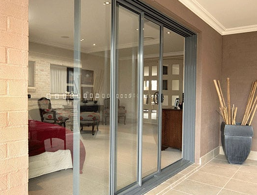 What is the difference between sliding and stacking doors